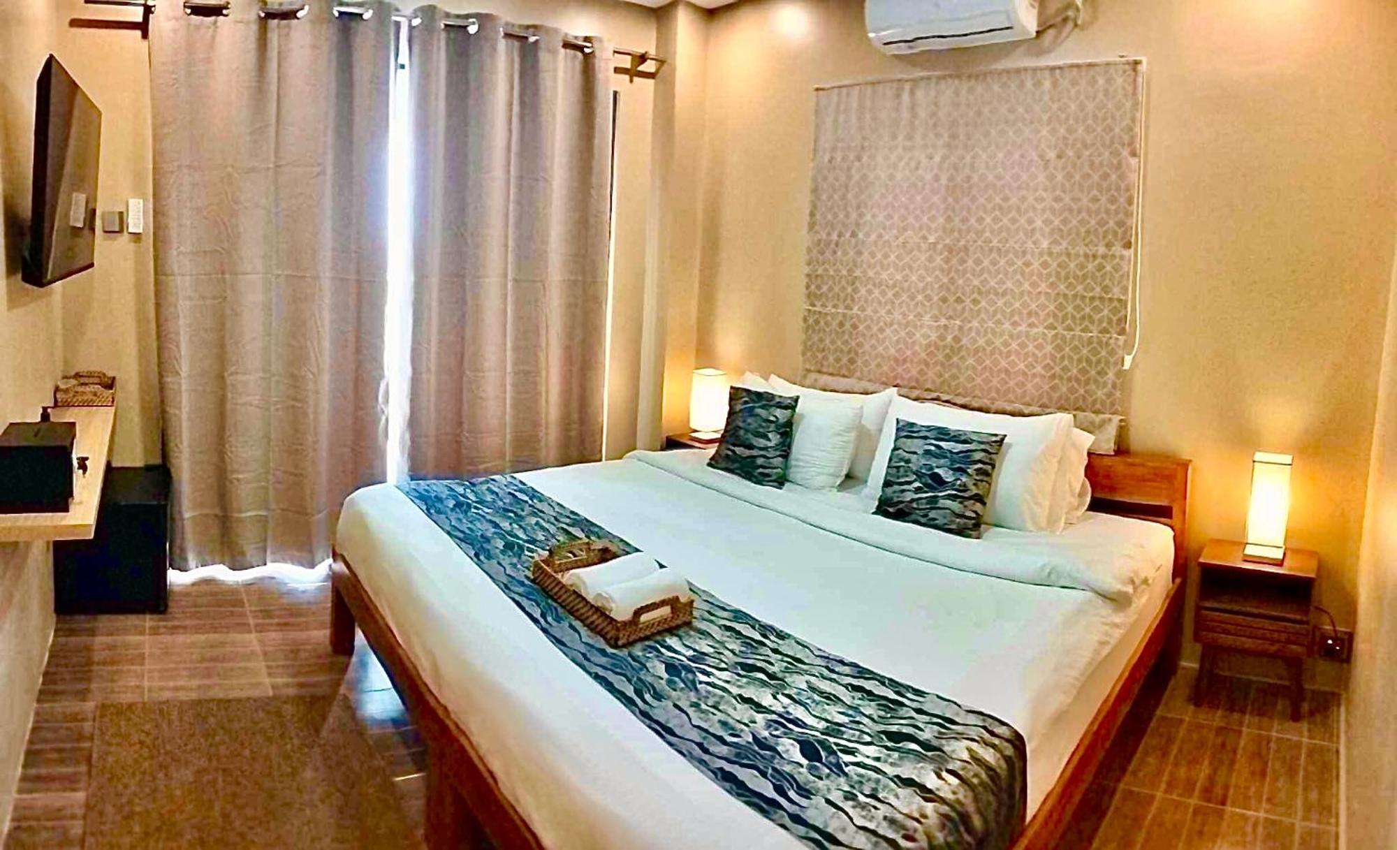 Southseas Beach Resort And Dive Center ซานตานเดร์ ภายนอก รูปภาพ