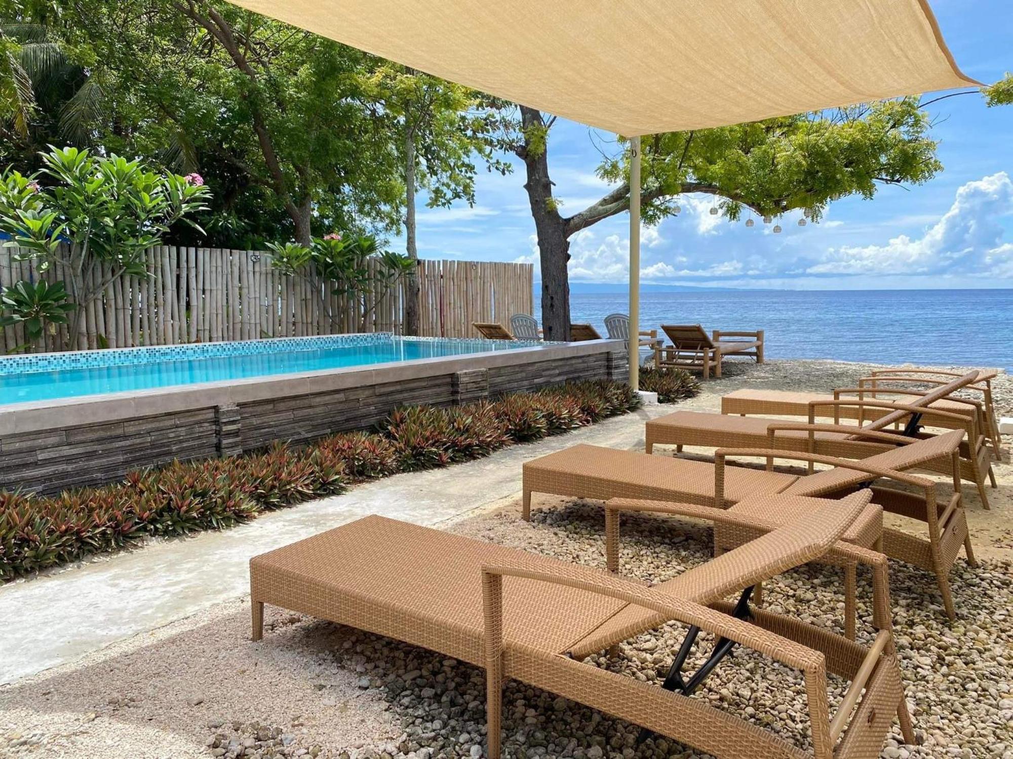 Southseas Beach Resort And Dive Center ซานตานเดร์ ภายนอก รูปภาพ